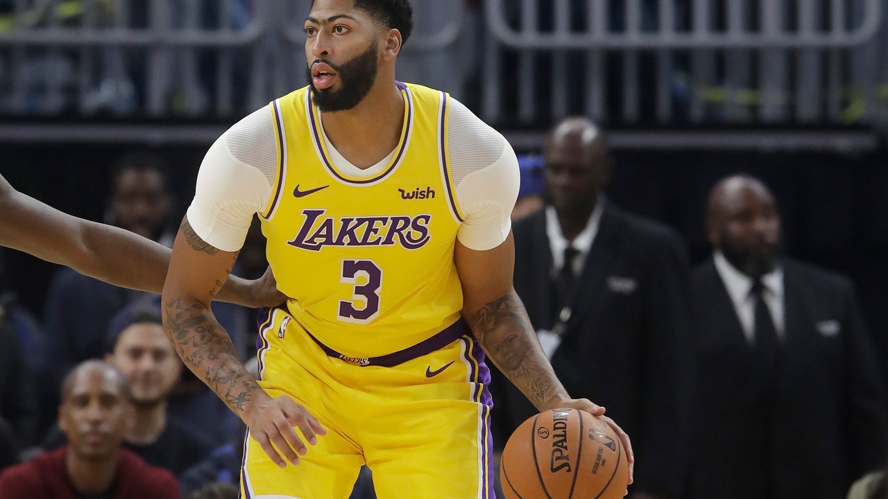 Davis hurt, Nets finish sweep of Lakers in China, 91-77